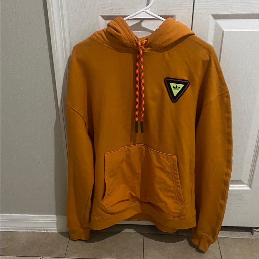 IVY PARK Orange Hoodie with Neon Green Logo
